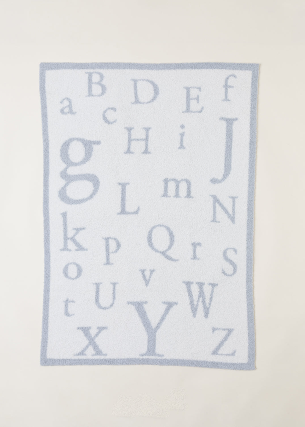Blue and white ABC pattern blanket
