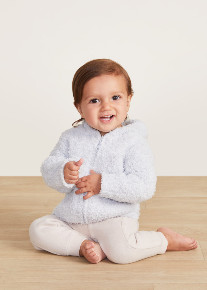 Baby wearing a blue hoodie