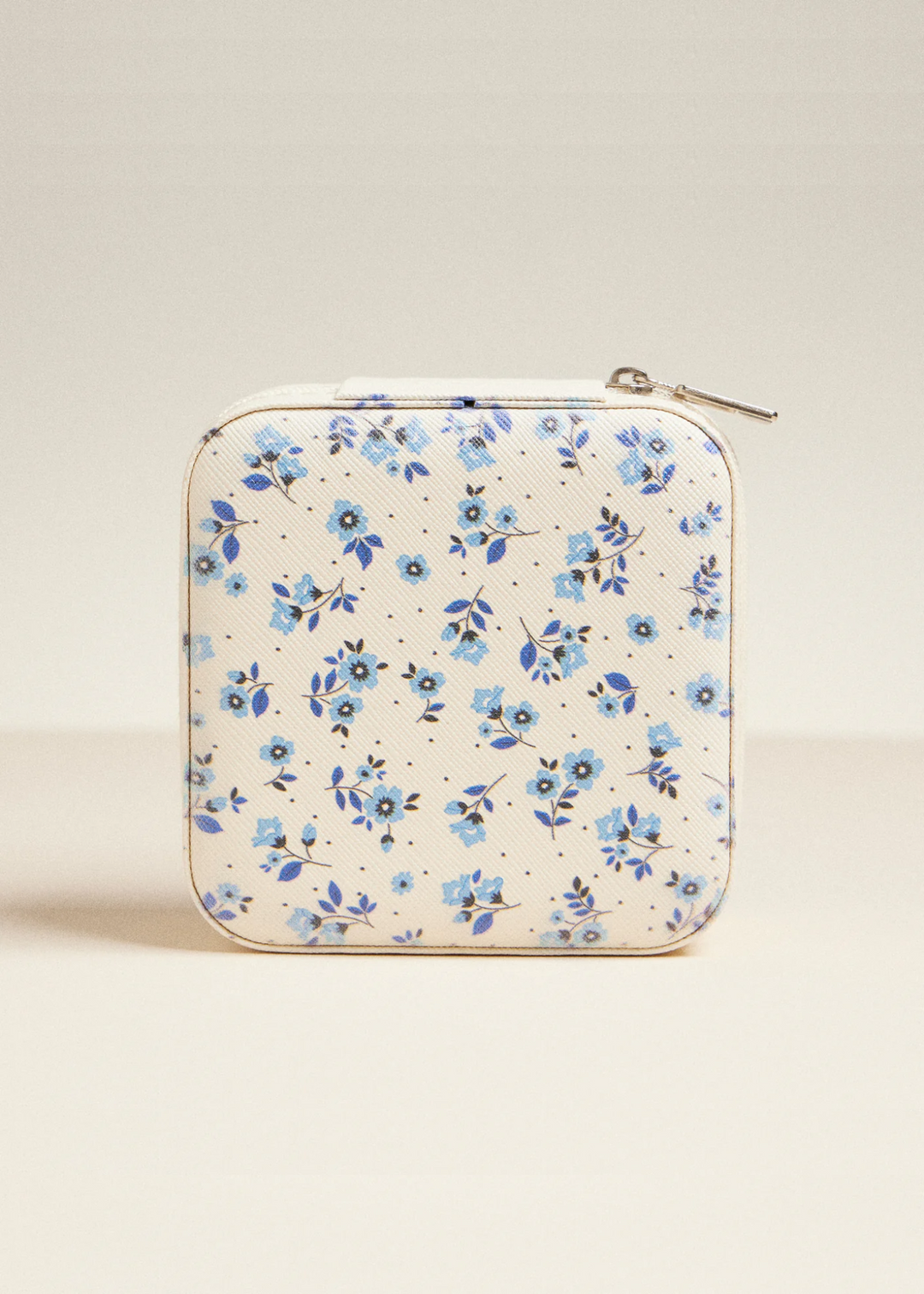 White jewelry box with a blue floral pattern on a white background
