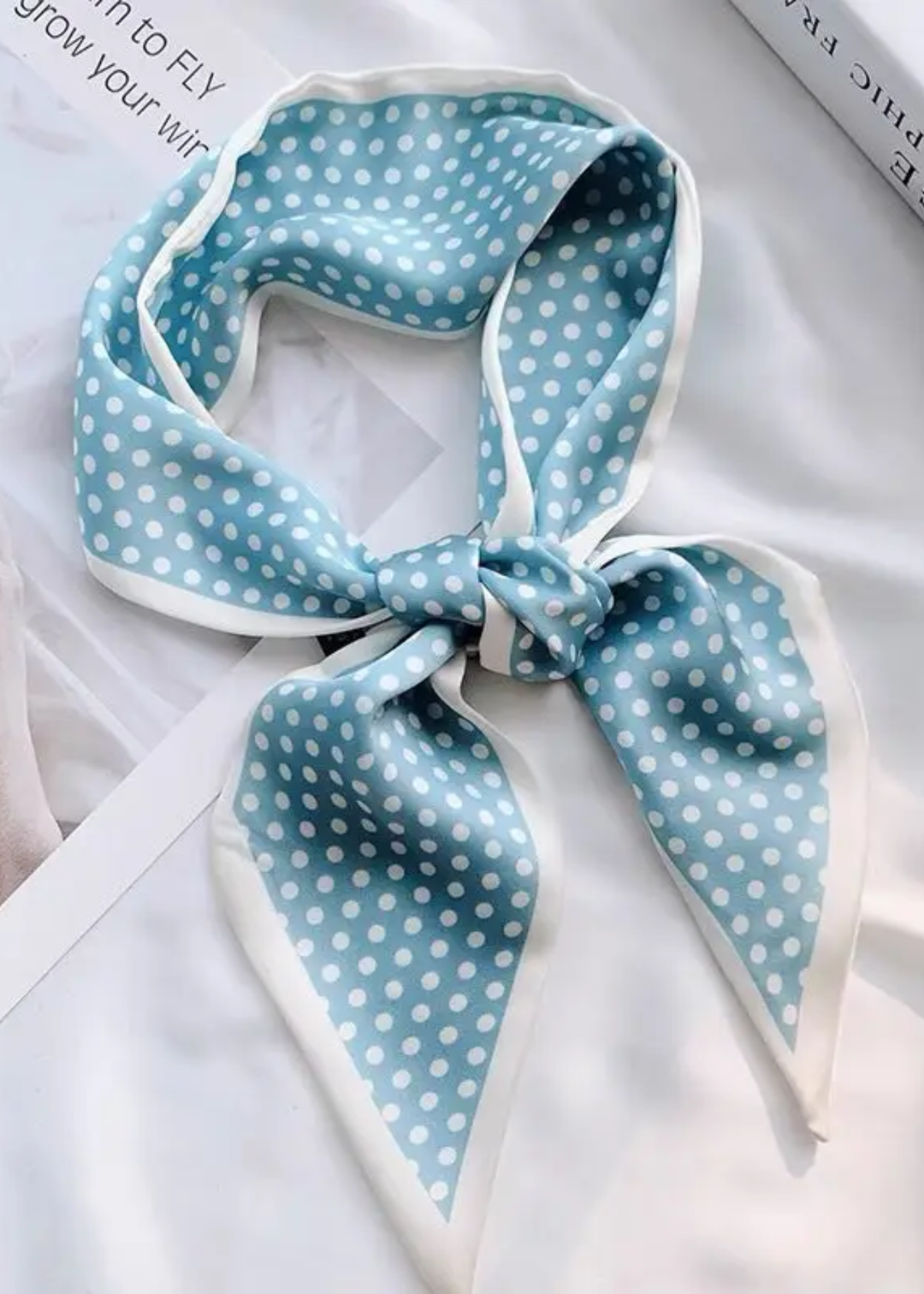 Blue satin scarf with white polka dots and trim