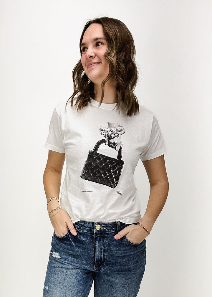 white short sleeve tee with purse and pearl graphic on chest