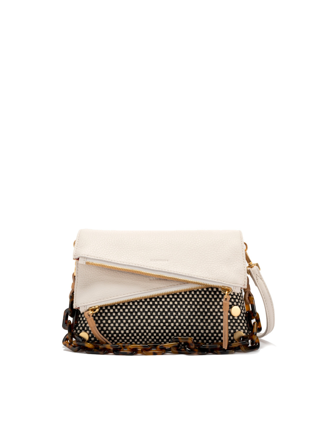 White, tan, and black handbag with gold accents against a white background