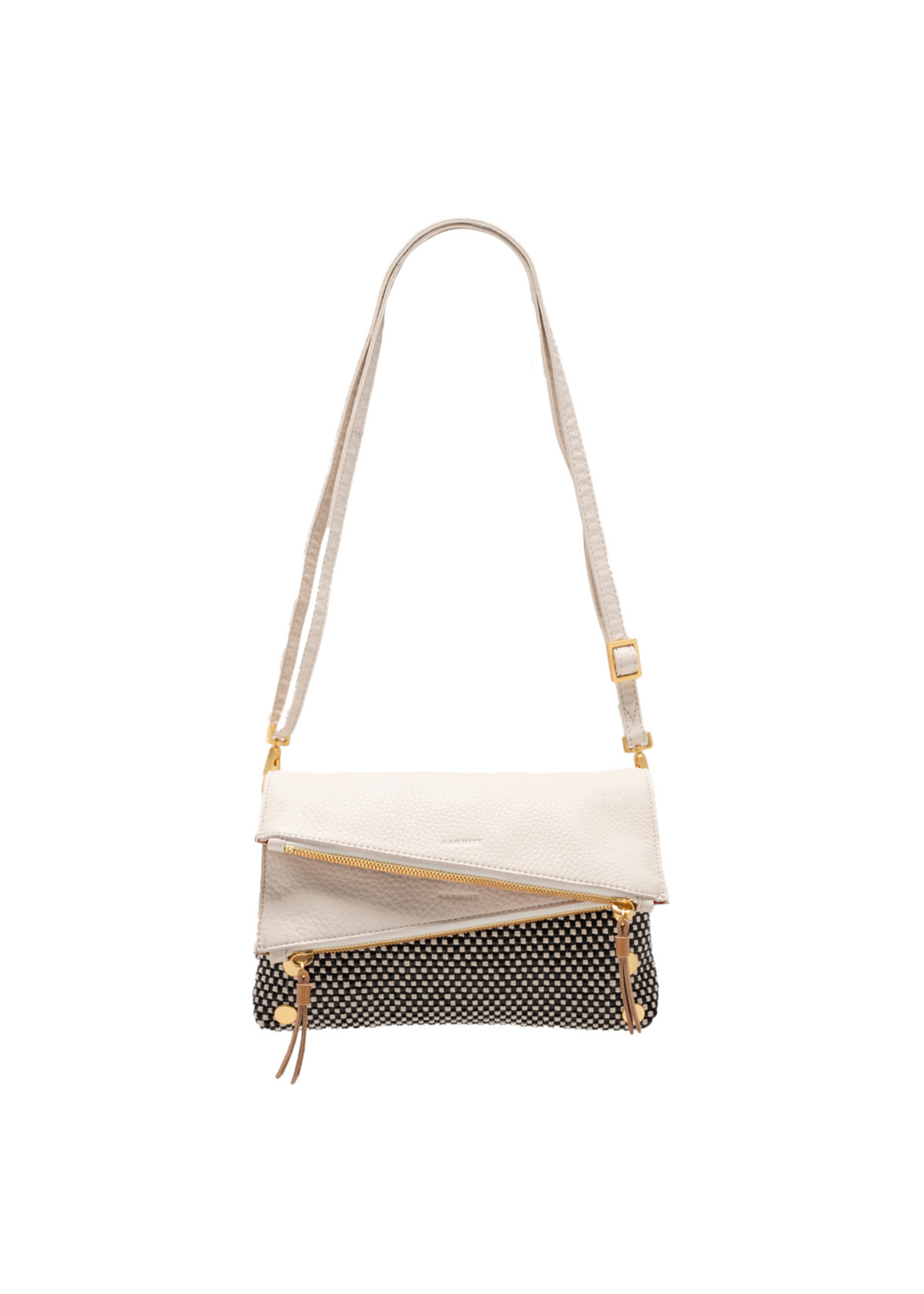 White, tan, and black handbag with gold accents against a white background