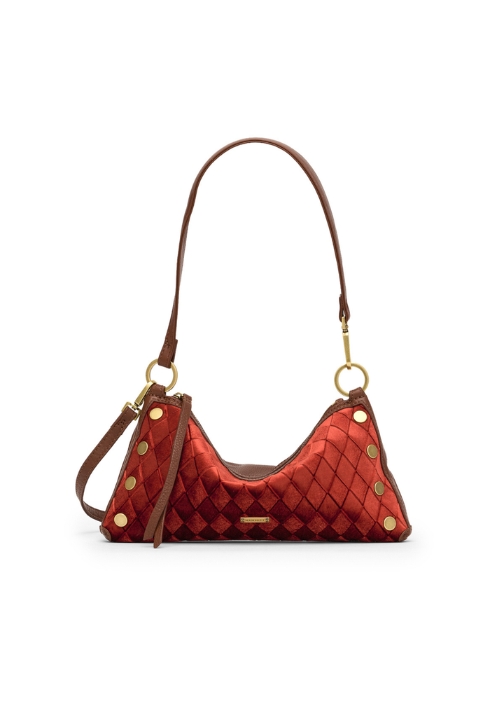 Red velvet handbag with brown and gold accents on a white background