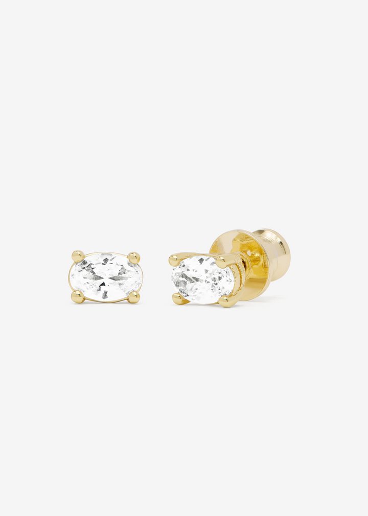 Women's oval diamond earrings in gold