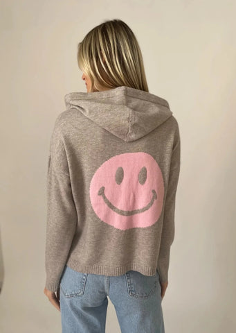 heather grey sweater hoodie with pink smiley face on back