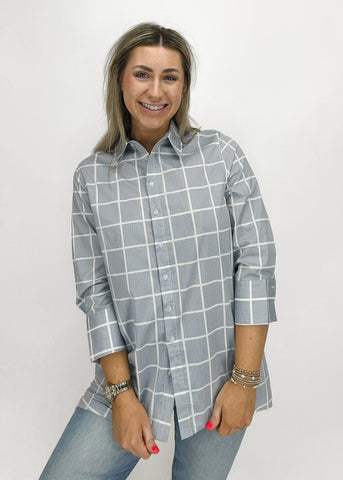 light grey denim button-down top with white grid pattern, elevated cuffs, and structured collar