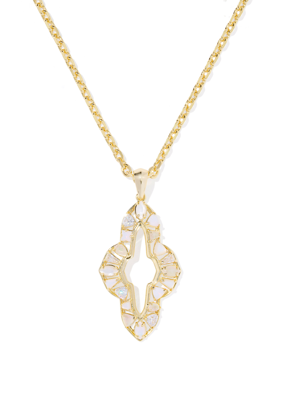Gold necklace with a neutral stone colored pendant on a white background