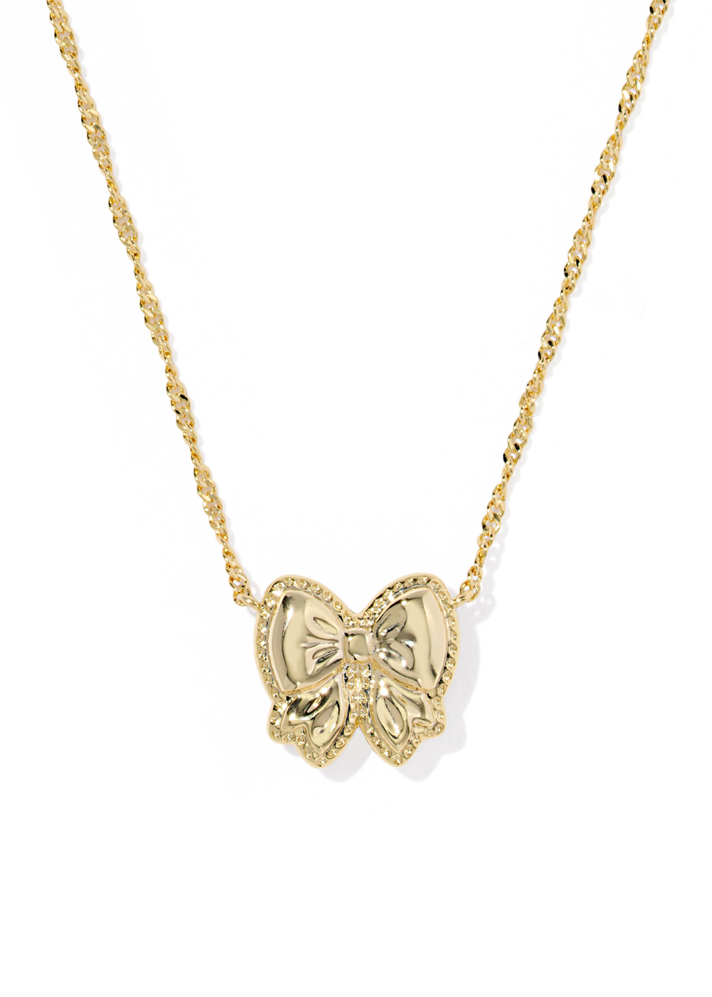 Gold necklace with a gold bow pendant on a white background
