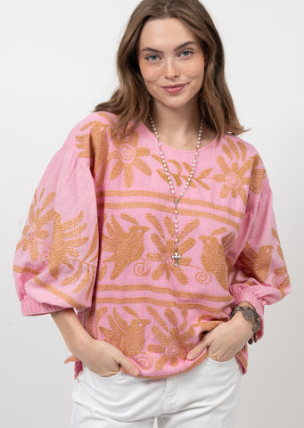 pink linen top with 3/4 puff balloon sleeves and orange embroidered floral and bird designs 