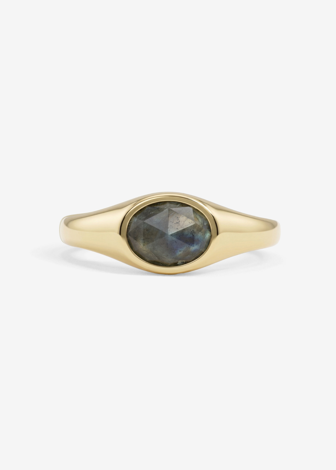 Gold signet ring with a labradorite stone on a white background