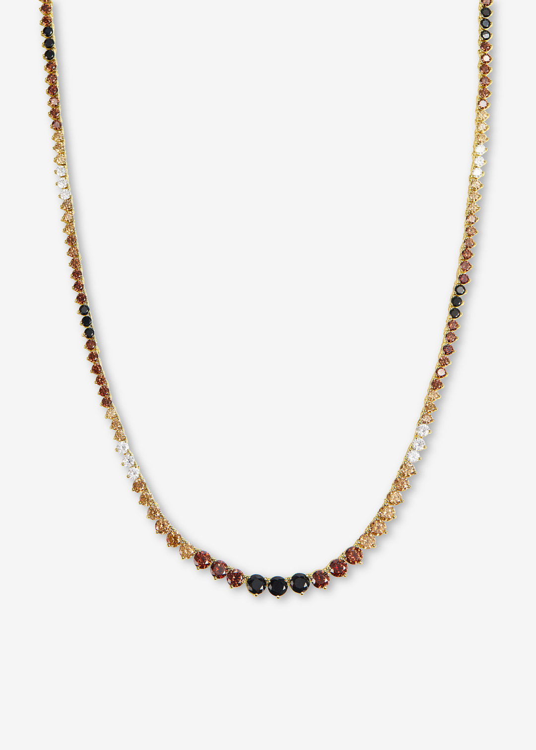 Black, brown, and white tennis necklace laying on a white background