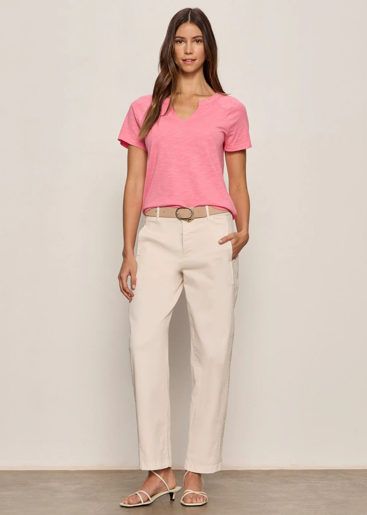 Woman wearing light pink jeans
