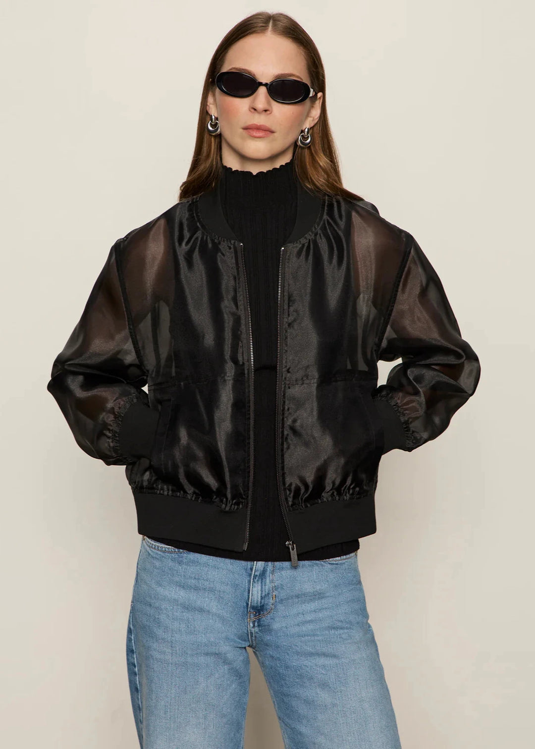 woman wearing black organza sheer bomber jacket