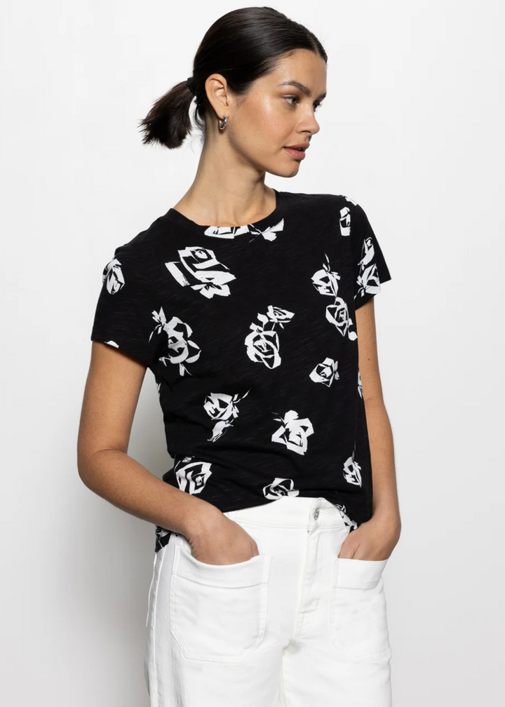 black short sleeve tee with white abstract rose print