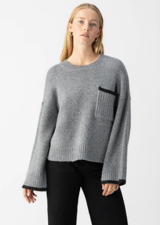 grey crew neck sweater with black stripe details