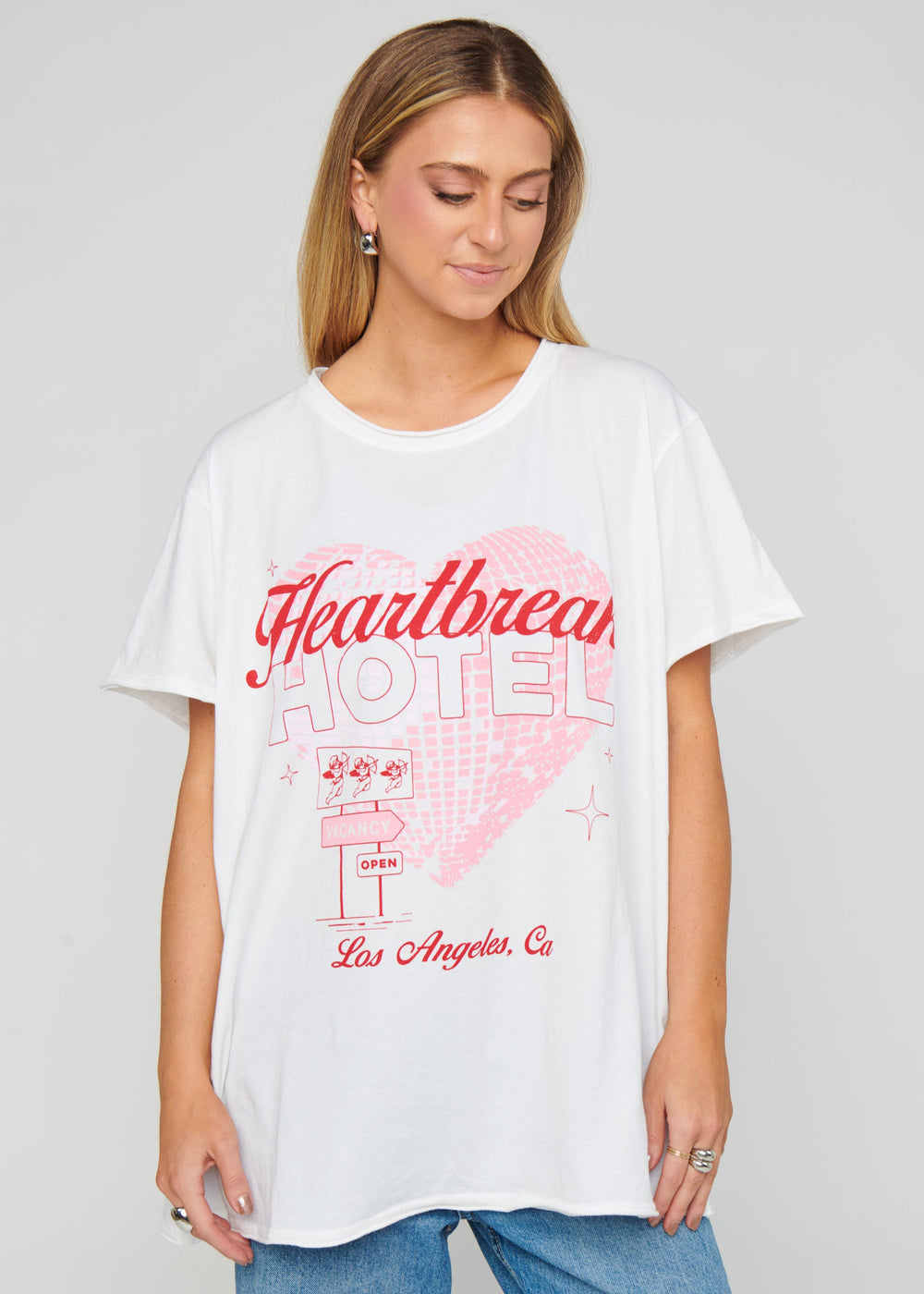 White graphic tee with red and pink heartbreak hotel Los Angeles disco chest graphic