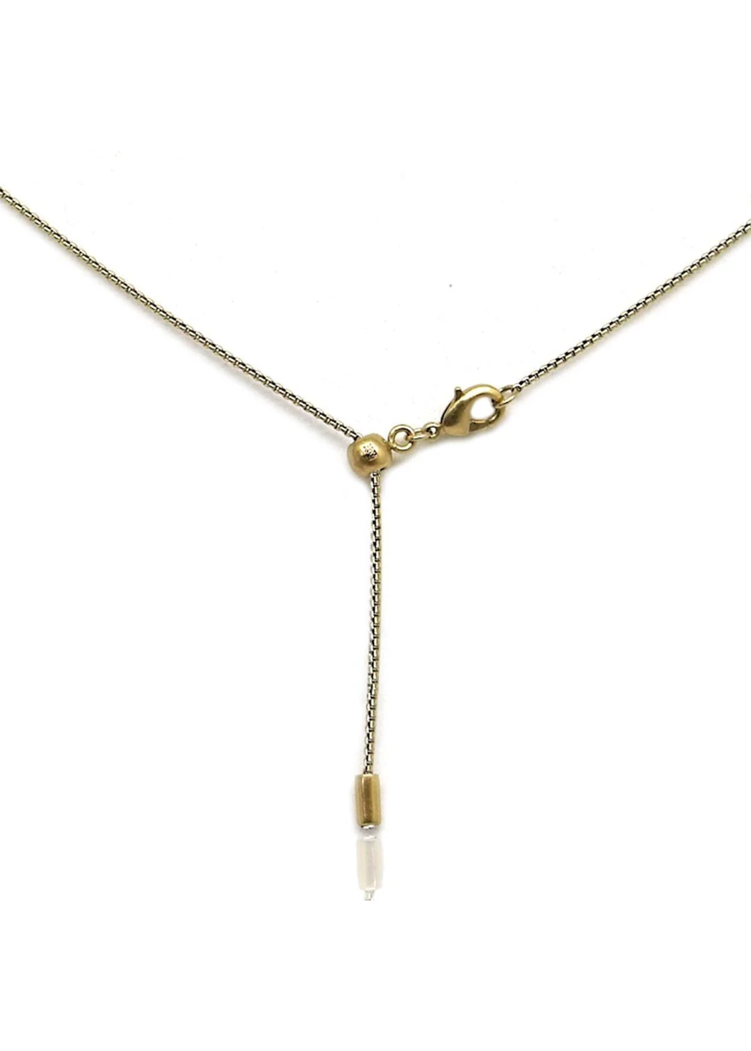 Gold necklace clasp on a white background