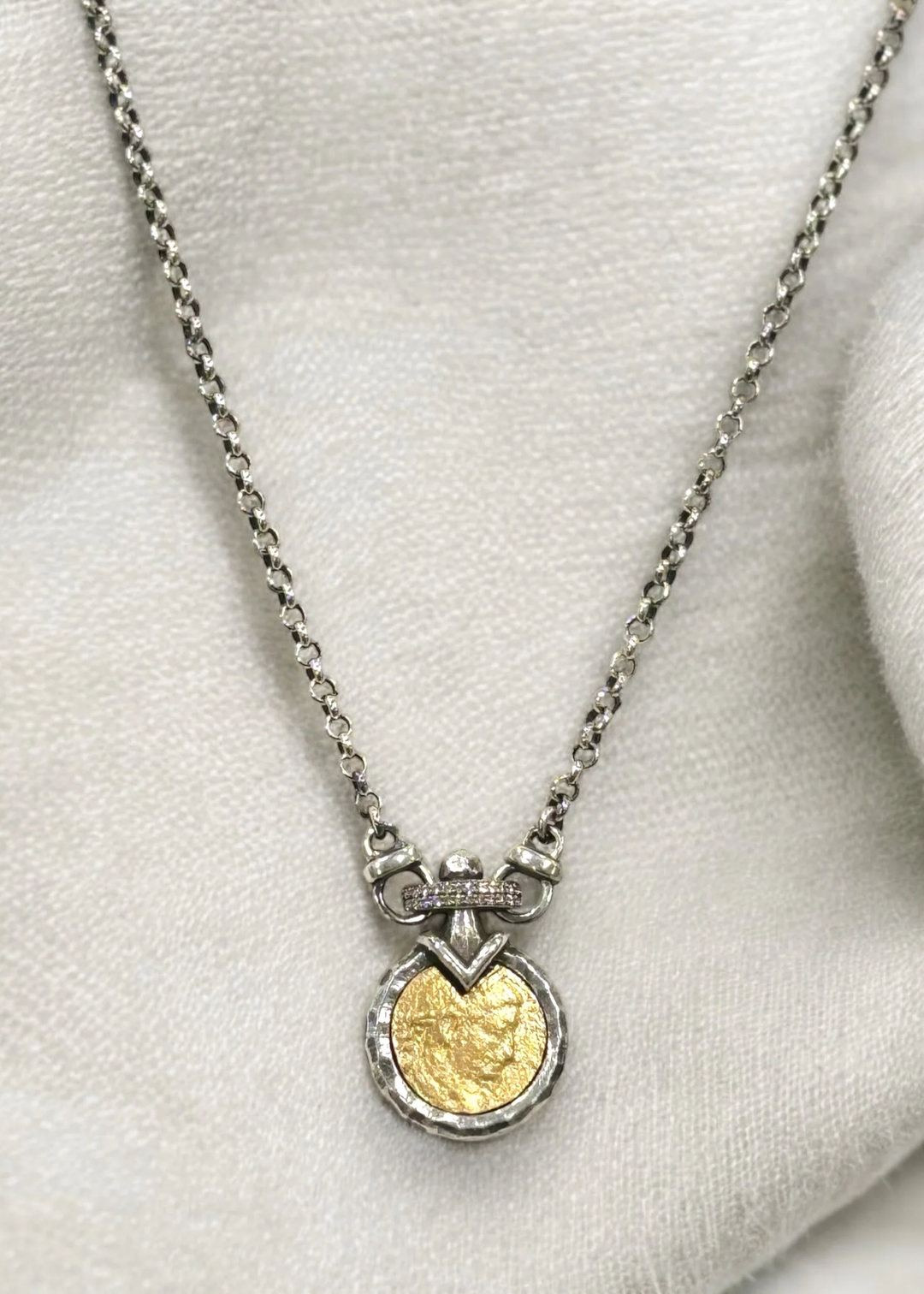 Vintage silver chain necklace with a gold coin