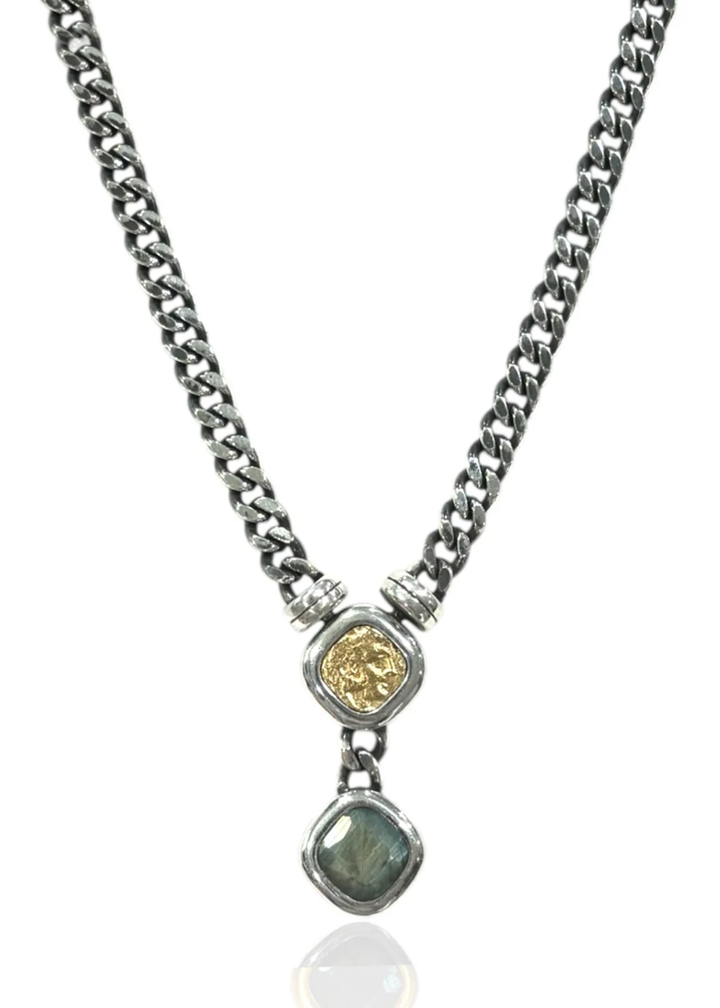 Vintage silver chain necklace with a gold coin and labradorite pendant on a white background