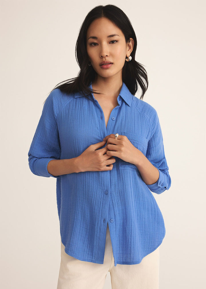 Women's blue gauze collared button down top
