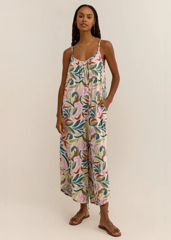 pink, green, blue, and rust floral tank top jumpsuit with pockets and asymmetrical ankle hems