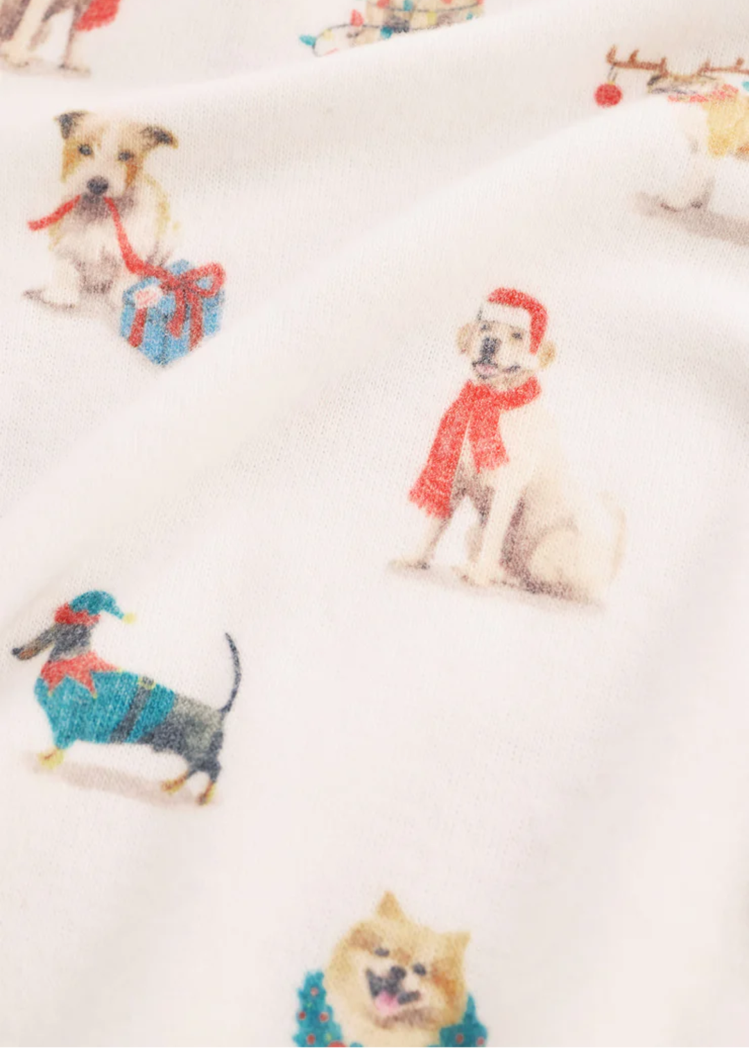 Close up of a fabric Christmas dog pattern