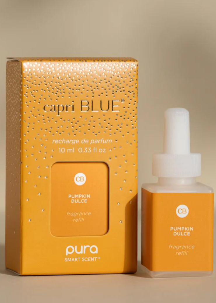 Capri Blue Pura Diffuser Refill in Pumpkin Dulce scent, featuring a warm fall fragrance refill bottle and packaging.