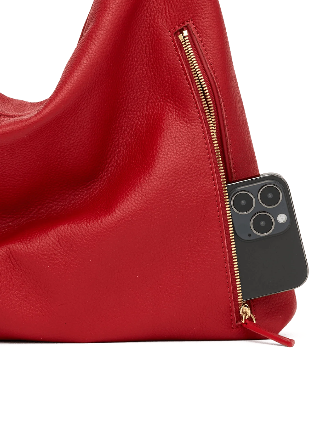 Red handbag with the handle up. 