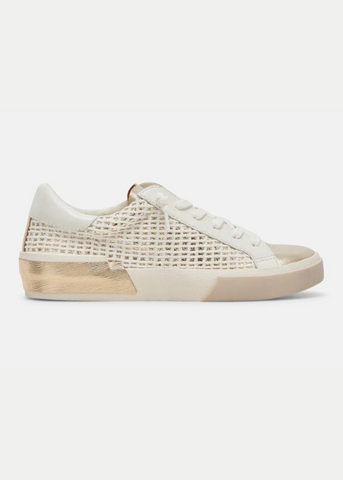 woven cream and gold sneakers with gold and tan sole details from Dolce Vita