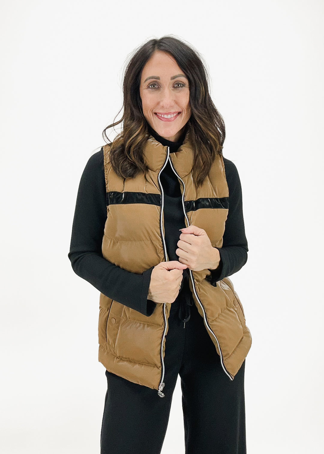 camel fitted women's puffer vest with black stripe accent