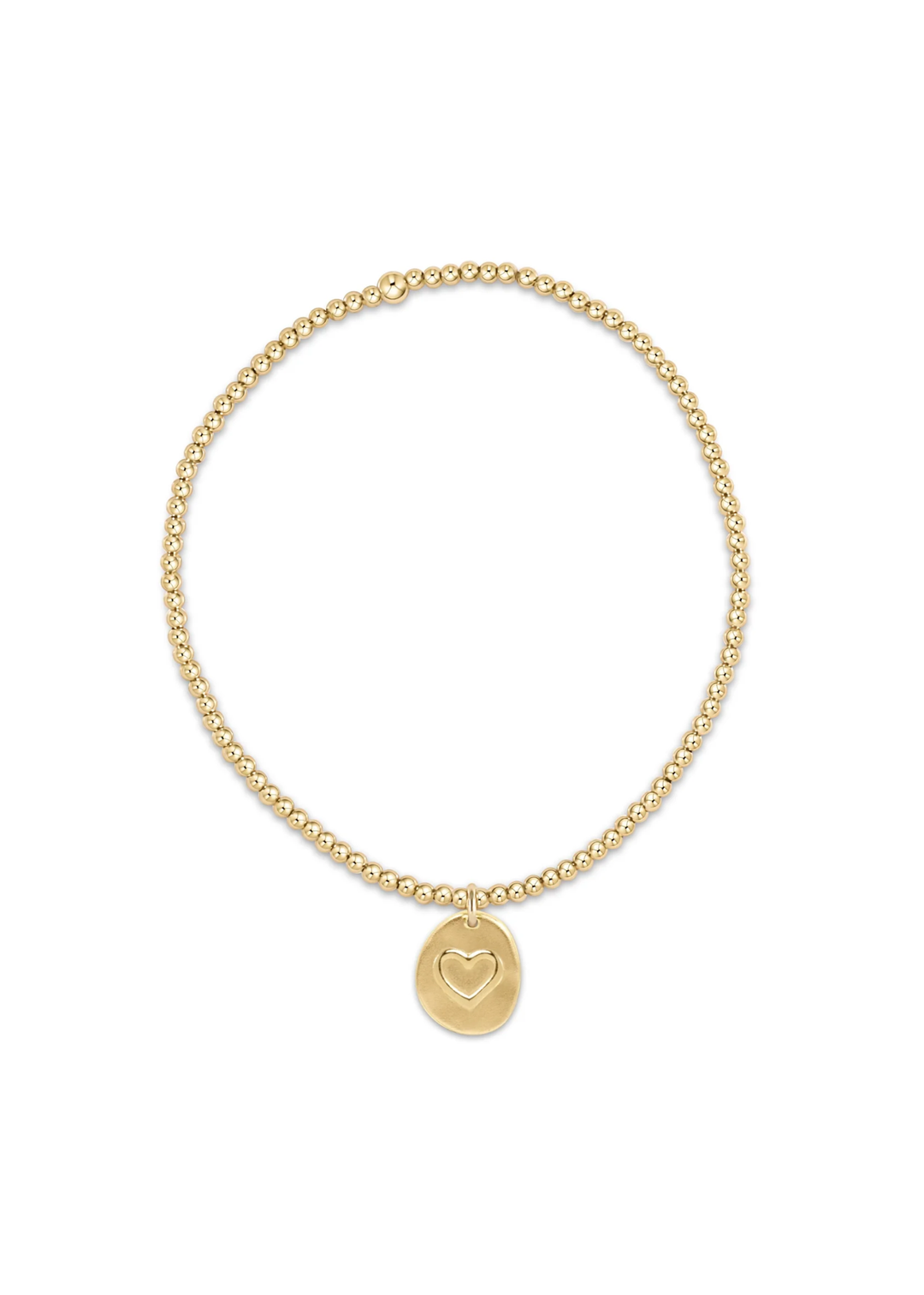 Gold beaded bracelet with a round gold heart charm on a white background
