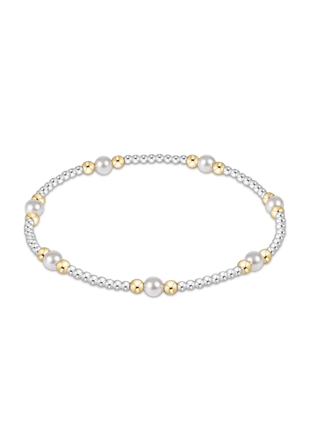 Mixed metal and pearl beaded bracelet on a white background