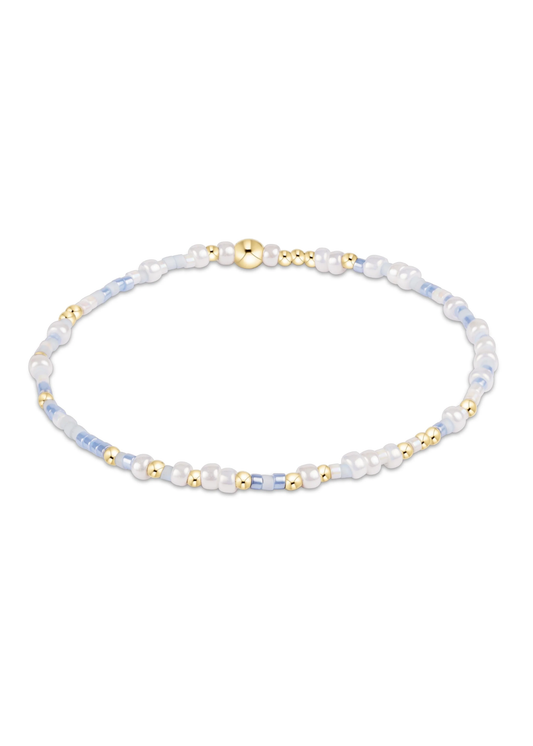 Blue, white, and gold beaded bracelet