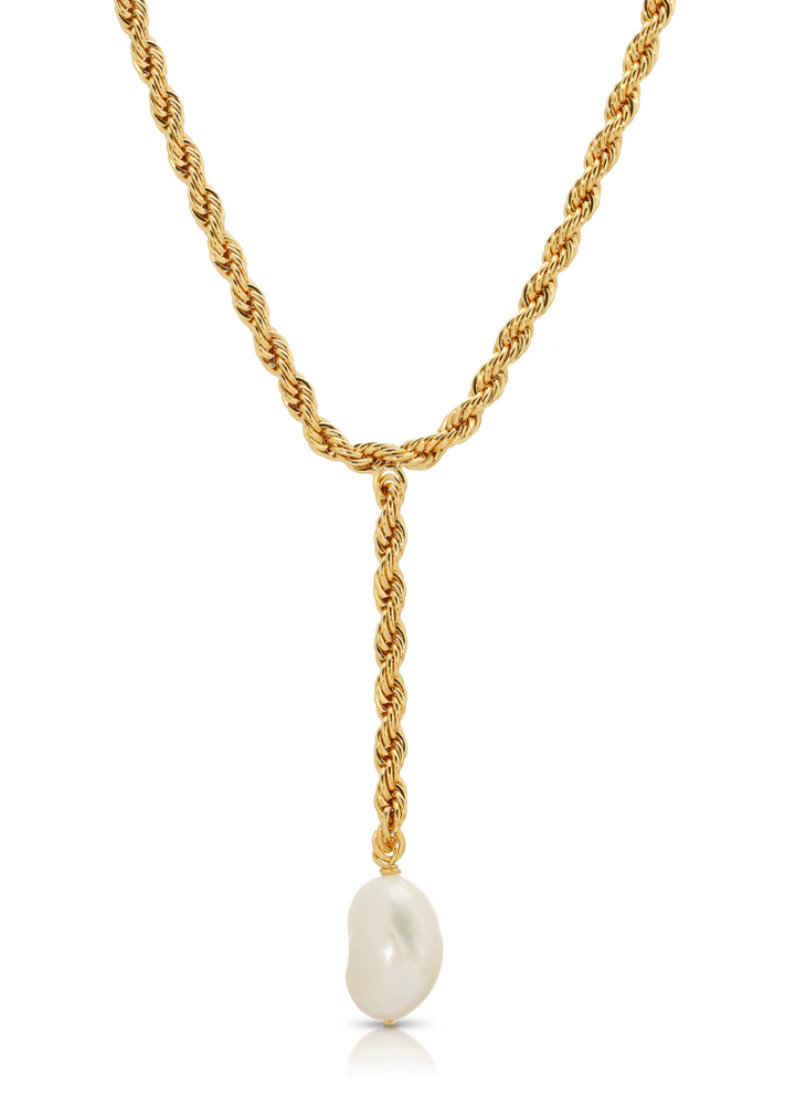 A sophisticated lariat-style gold rope chain necklace featuring a single baroque pearl pendant, adding an elegant touch from Leeada's Bryn collection.