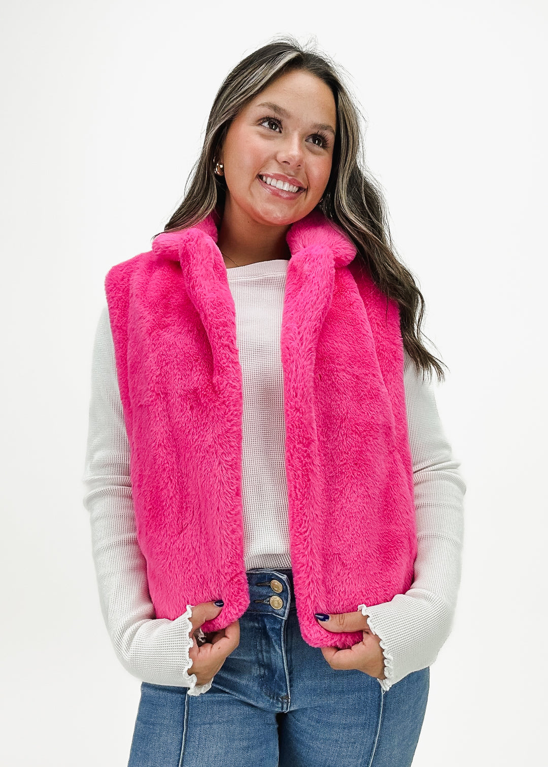 Angelica Plush Faux Fur Vest in hot pink, featuring a soft and cozy design perfect for layering over casual or dressy outfits.