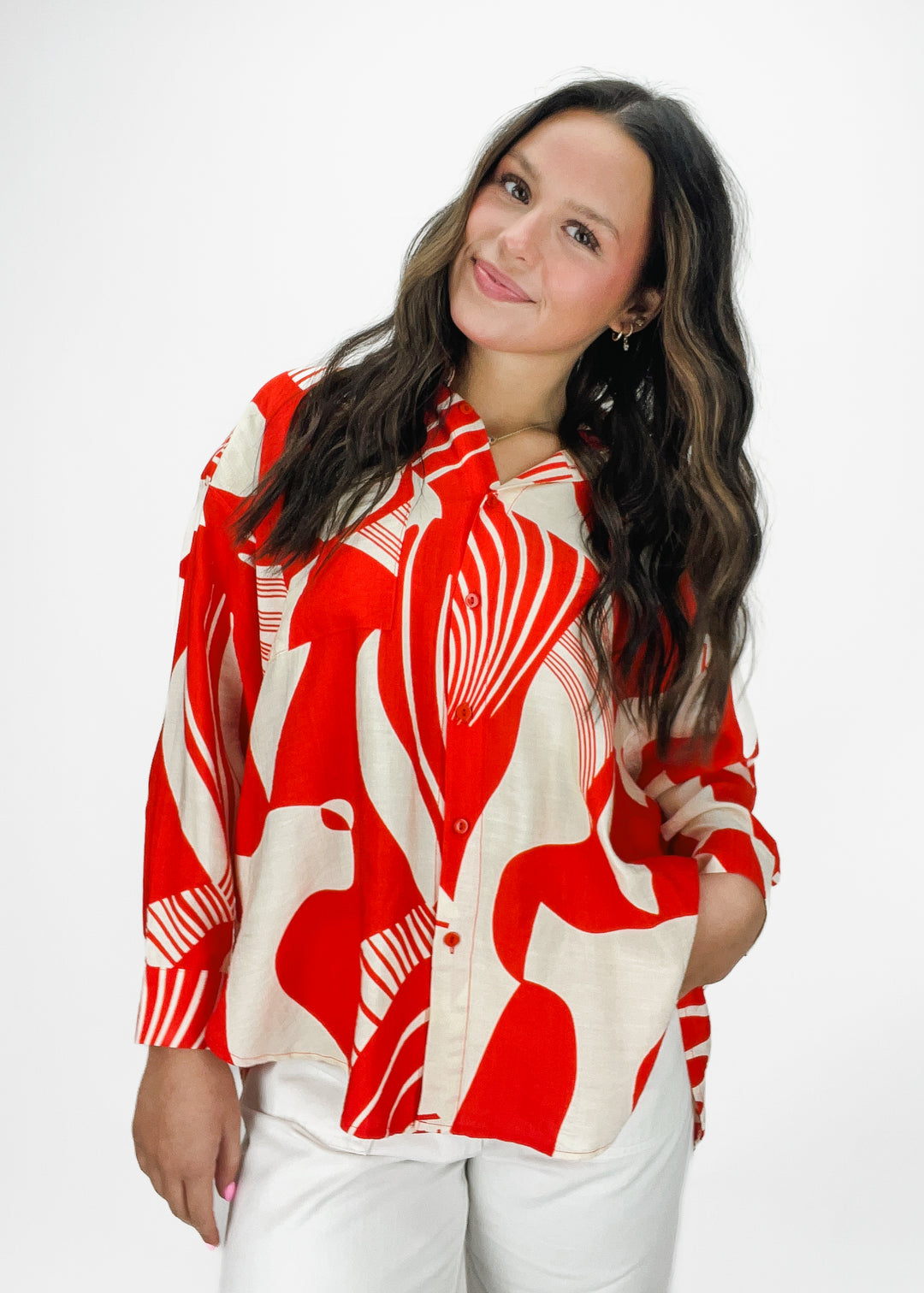 women's cream and red abstract print collared long sleeve button down