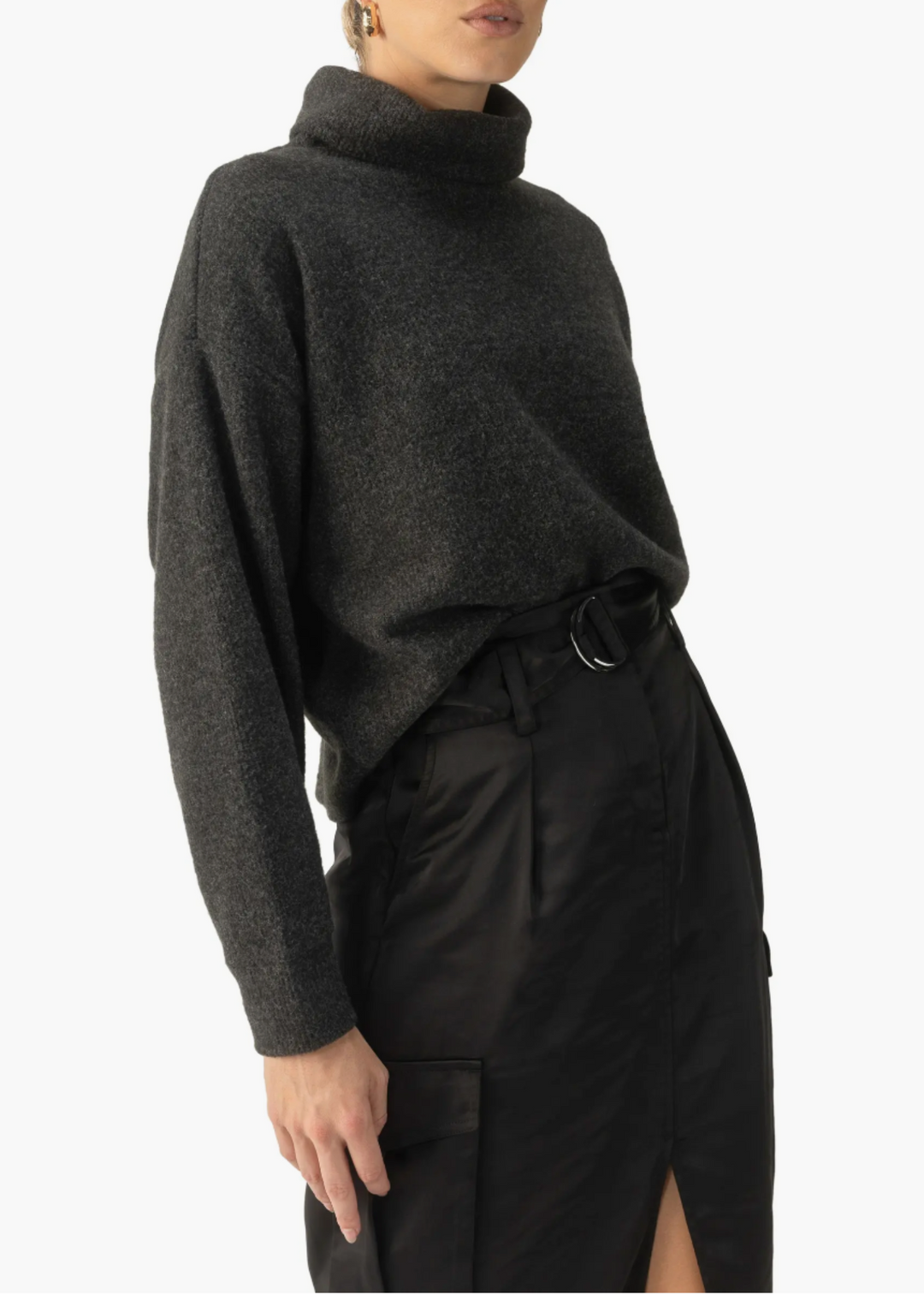 Sanctuary Clothing Everyday Cozy Popover in dark charcoal, featuring a relaxed fit, cozy turtleneck, and versatile styling options.