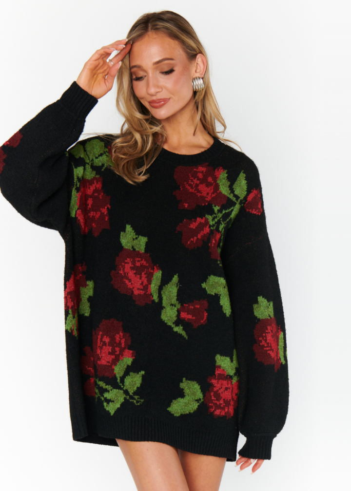 Show Me Your Mumu Summit Sweater featuring the "Send Me Roses" print with bold red roses and green foliage on a black knit backdrop.