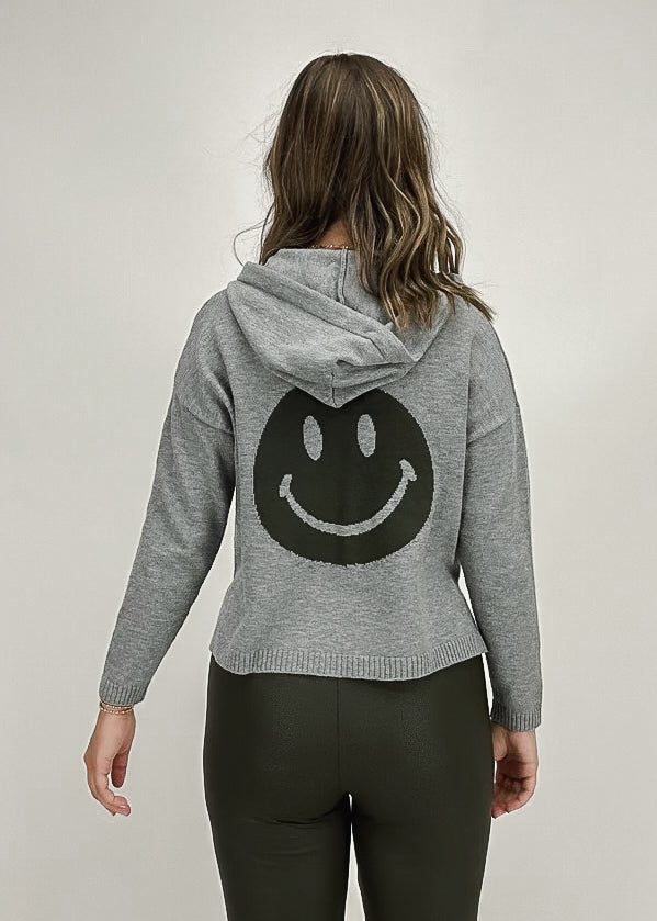 Heather grey women's drawstring hoodie sweater with olive green smiley face on back