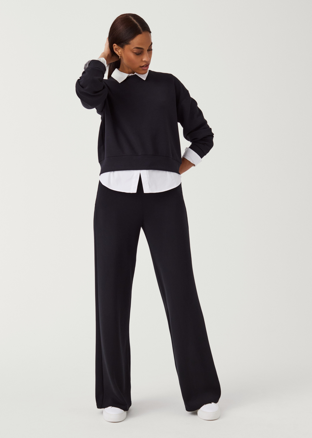 spand black wide leg drawstring sweatpants with white collared tee and black cropped crew neck