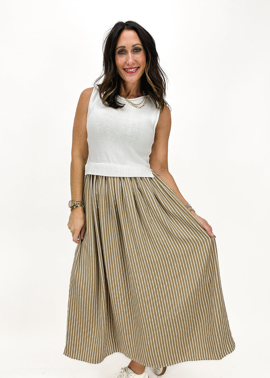 Women' maxi dress with white knit tank top and striped ruffle skirt