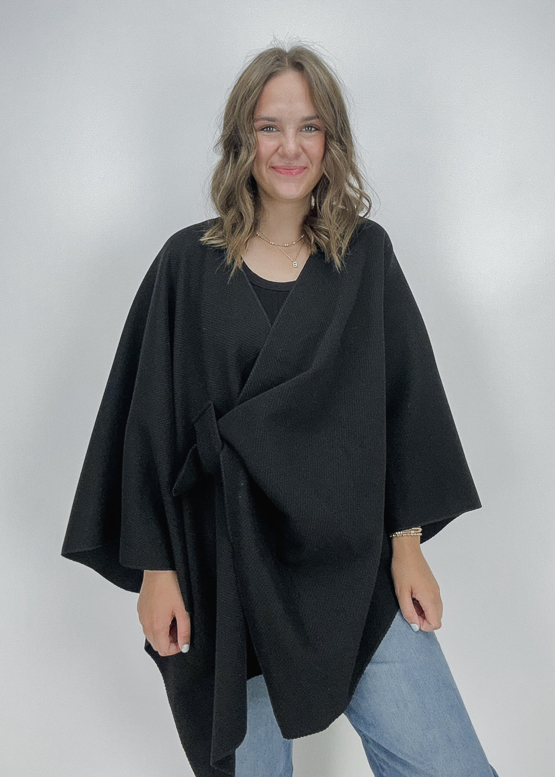 women's black knit oversized poncho