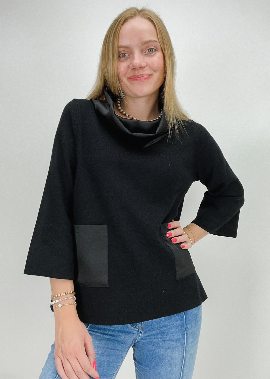 black crop sleeve turtleneck sweater top with satin pockets and turtleneck