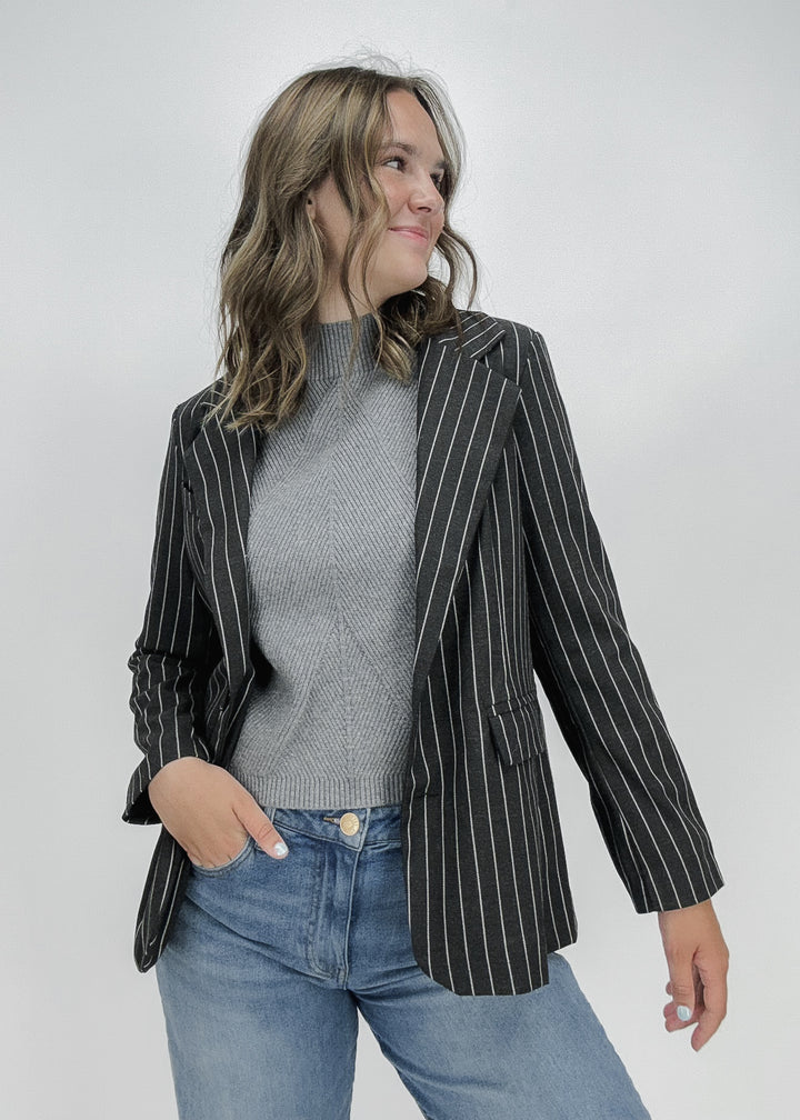 charcoal pinstripe blazer styled over hip crop mock neck knit grey sweater