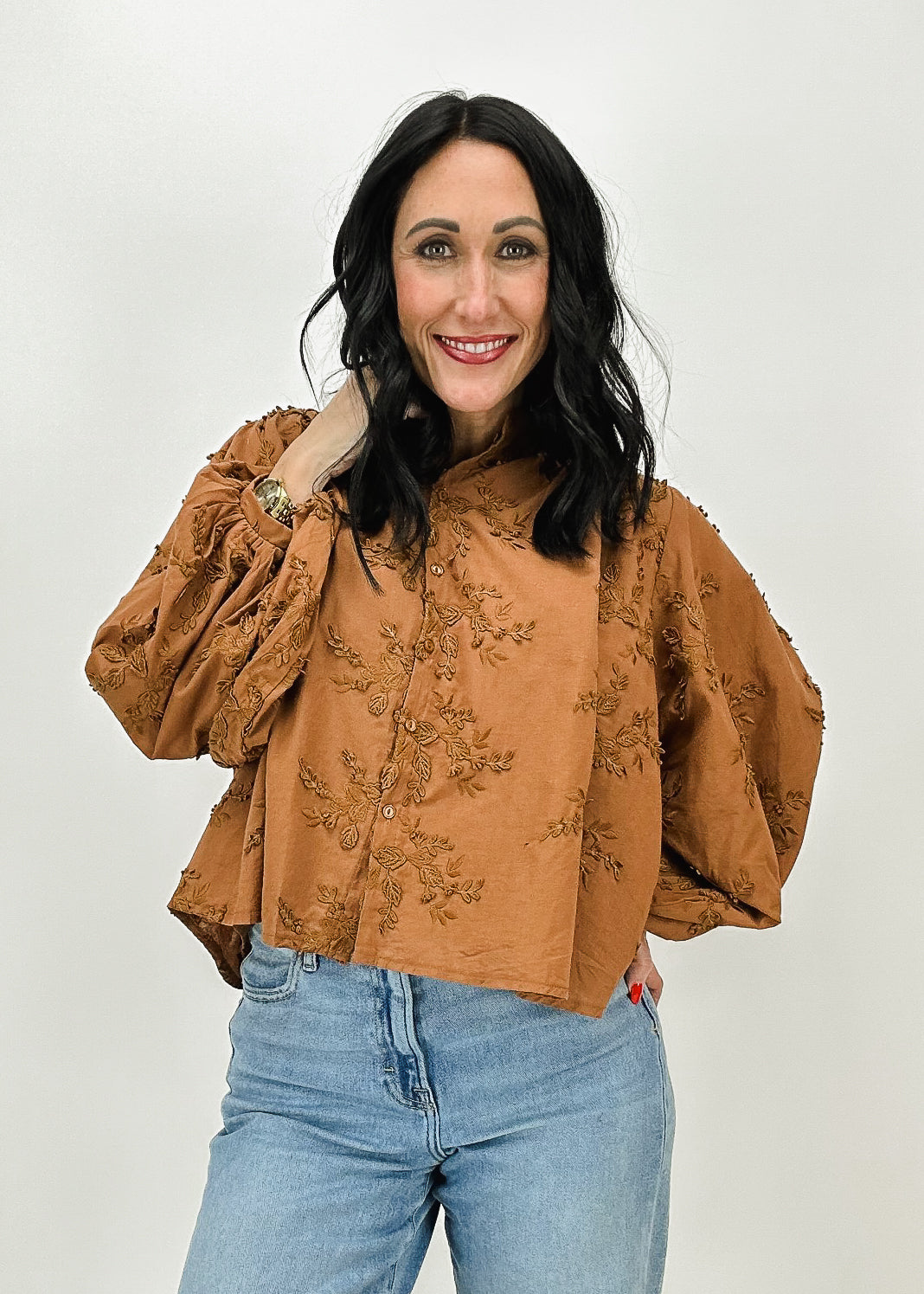 Women's chestnut embroidered button-up top with voluminous sleeves