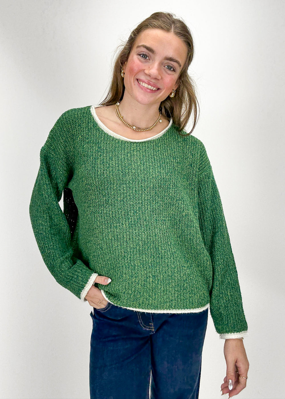 Person wearing a green sweater 