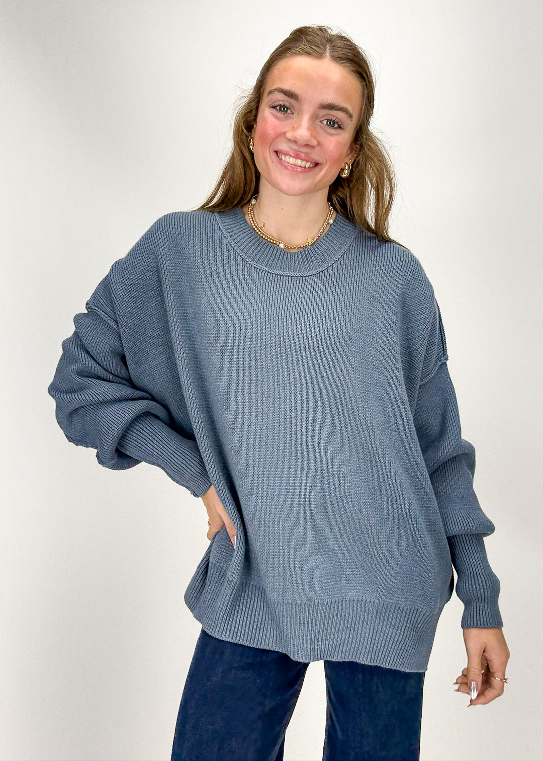 Woman wearing a blue sweater 