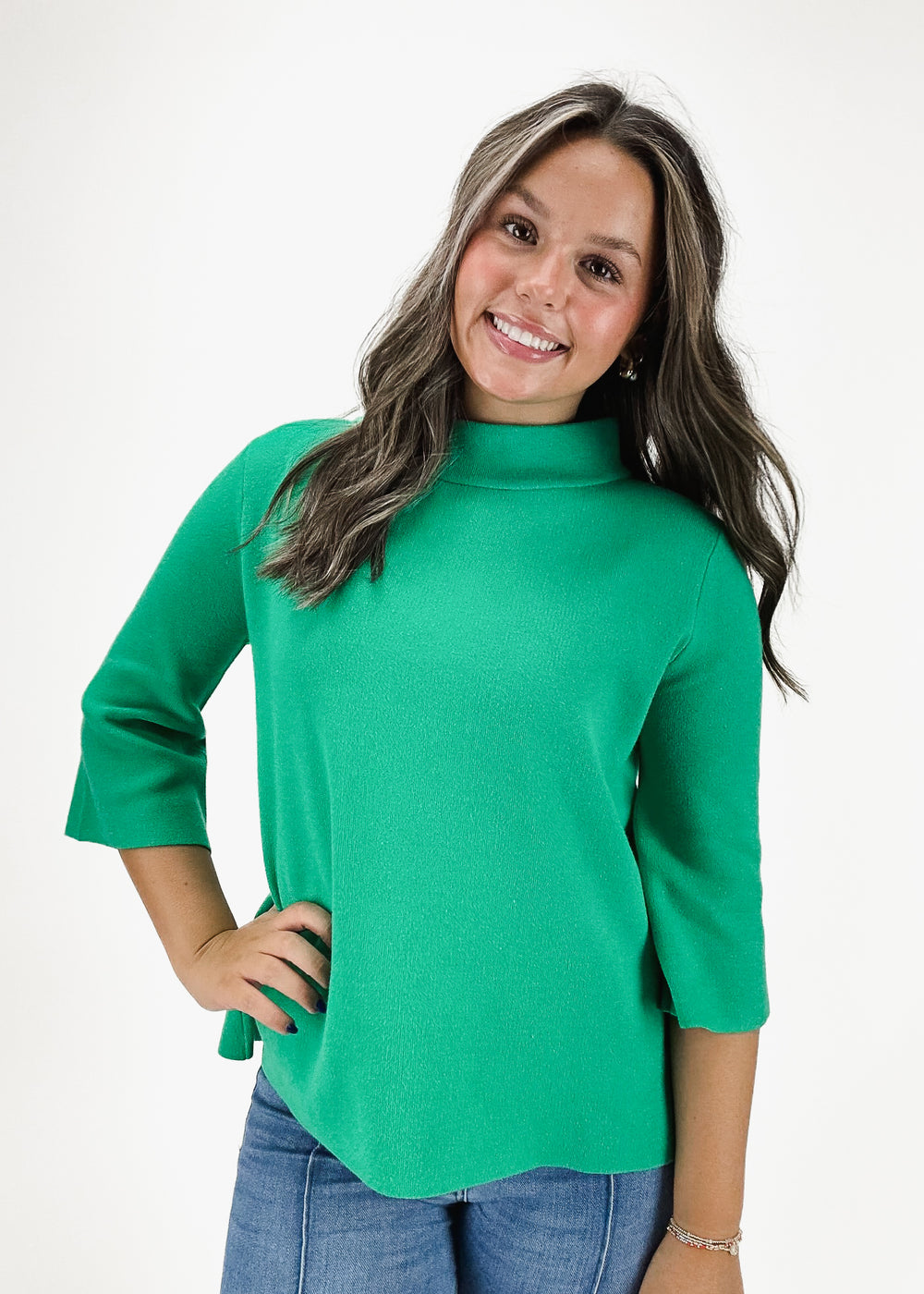 Women's kelly green mock neck knit sweater by June & Beyond, featuring a 3/4 sleeve design, lightweight knit fabric, and stylish relaxed fit.