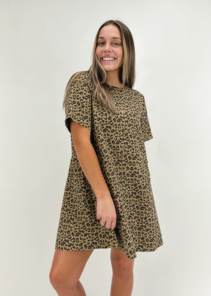 Women's short-sleeve leopard print mini dress, featuring a relaxed fit and chic animal pattern